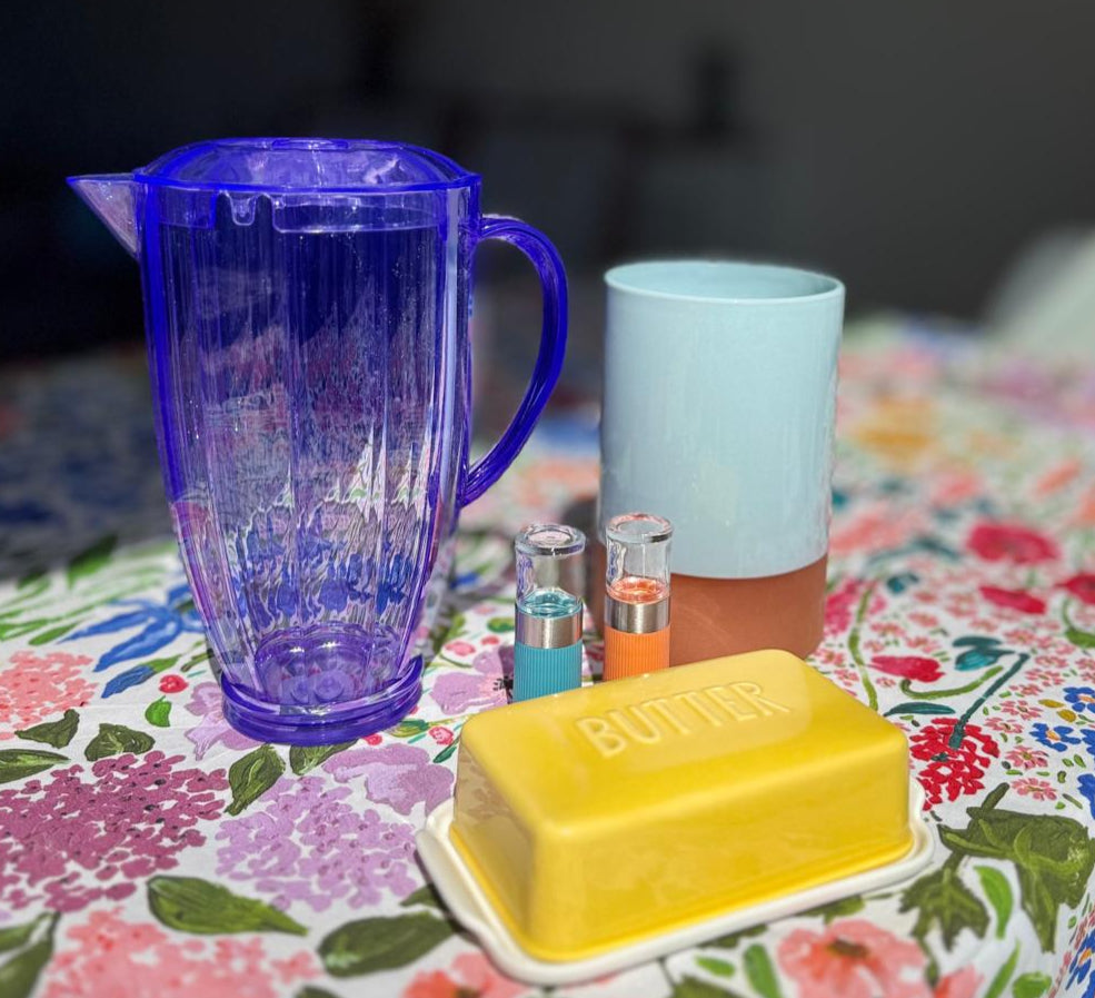 Vibrant water jug, butter dish, salt and pepper pots and wine cooler available to hire from the vibrant collection for fun dinner parties