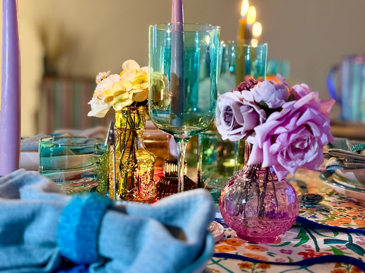 Vibrant blue glasswear with blue linen napkins and accessories styled for a hired tablescape experience
