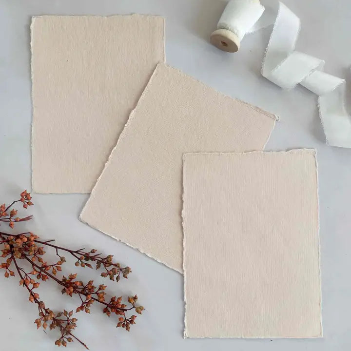 Personalisable place cards displayed on an elegant tablescape for intimate hosting