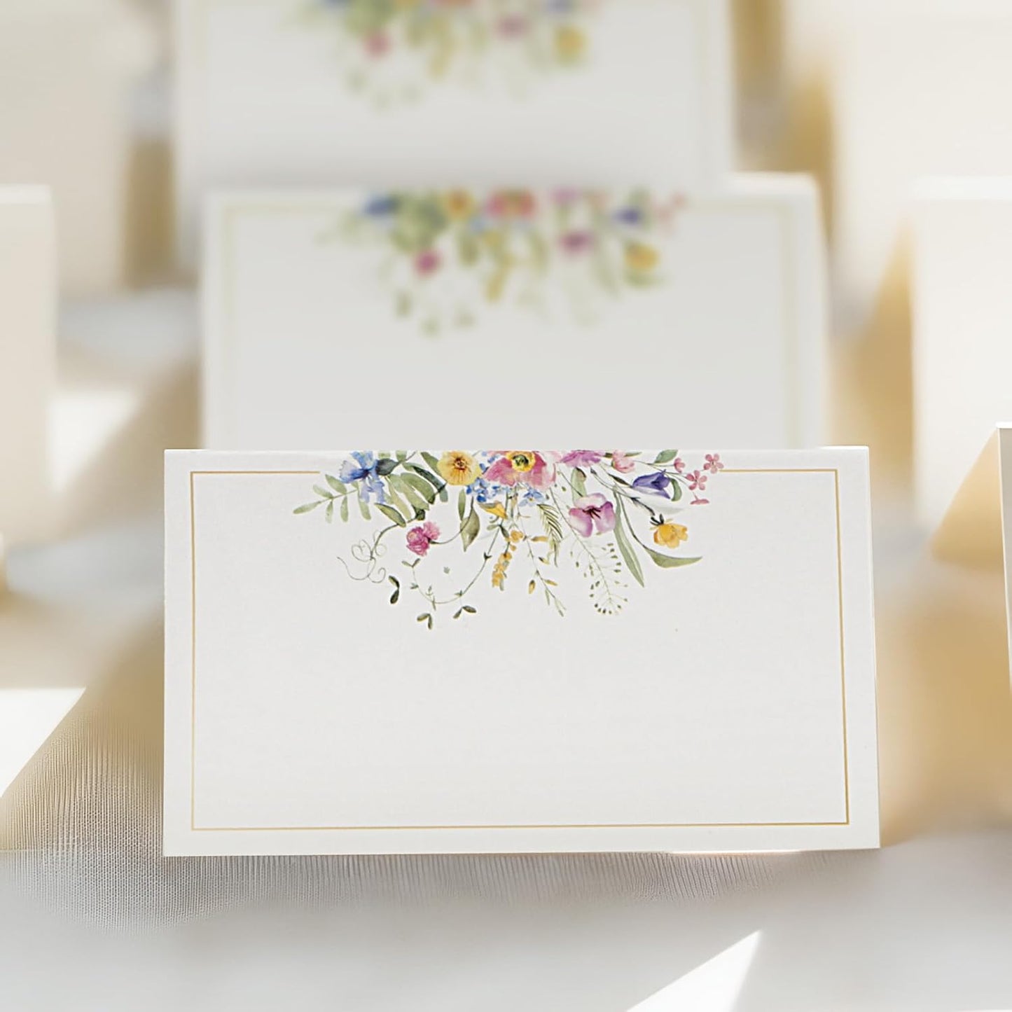 Colourful floral place name cards
