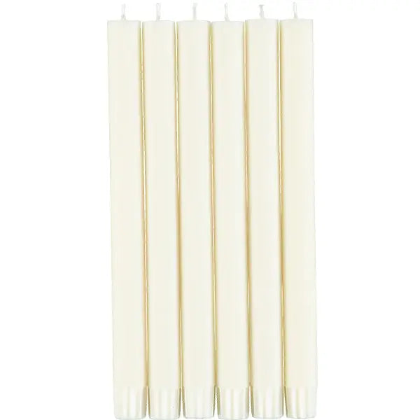 Elegant dinner candles providing ambient lighting on a tablescape for entertaining